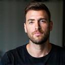 Professional portrait of James McGregor, founder of an urban pet tech start-up.